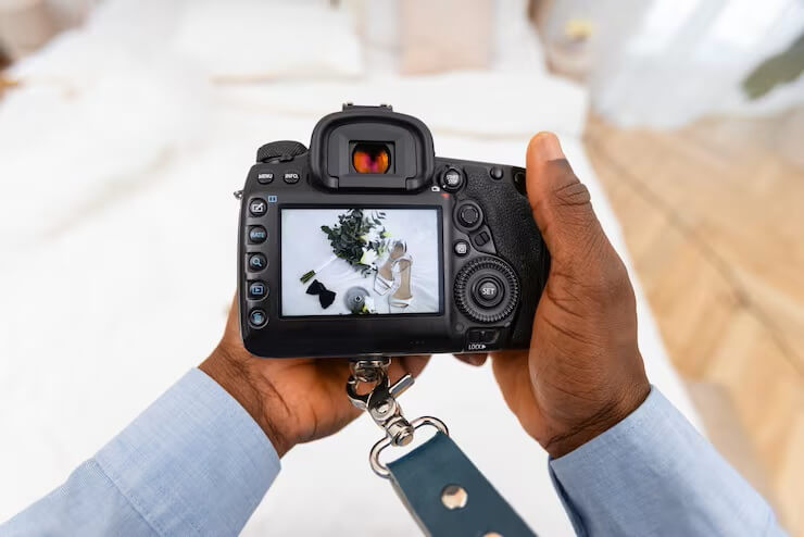 photographer-holding-camera