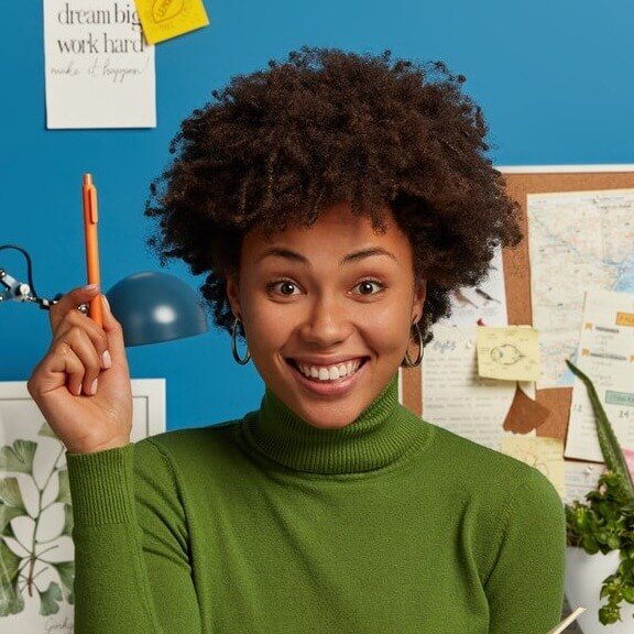 young-woman-holds-pen